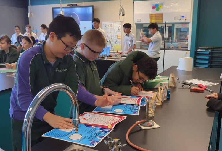 An image of students doing science experiments